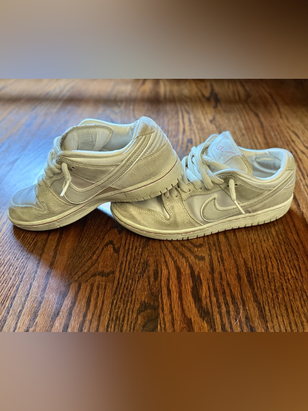 Nike Youth 6.5 Off-White Dunk Low Sneakers with Subtle Red Accent